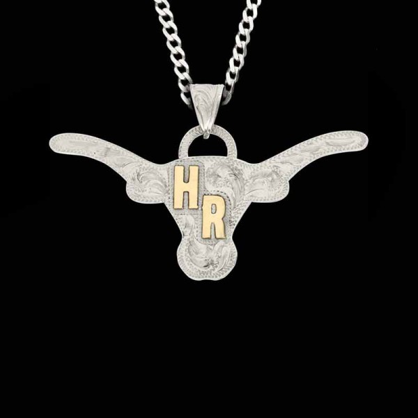 Pull together your Western look with the Longhorn Custom Pendant. Personalize it with your initials in golden Jeweler's Bronze on a hand engraved silver base. Pair it with a sterling silver chain now!